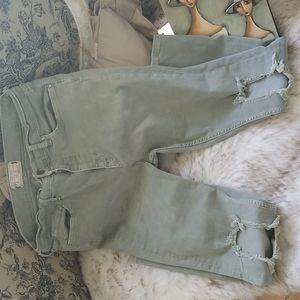 Free People green distressed jeans